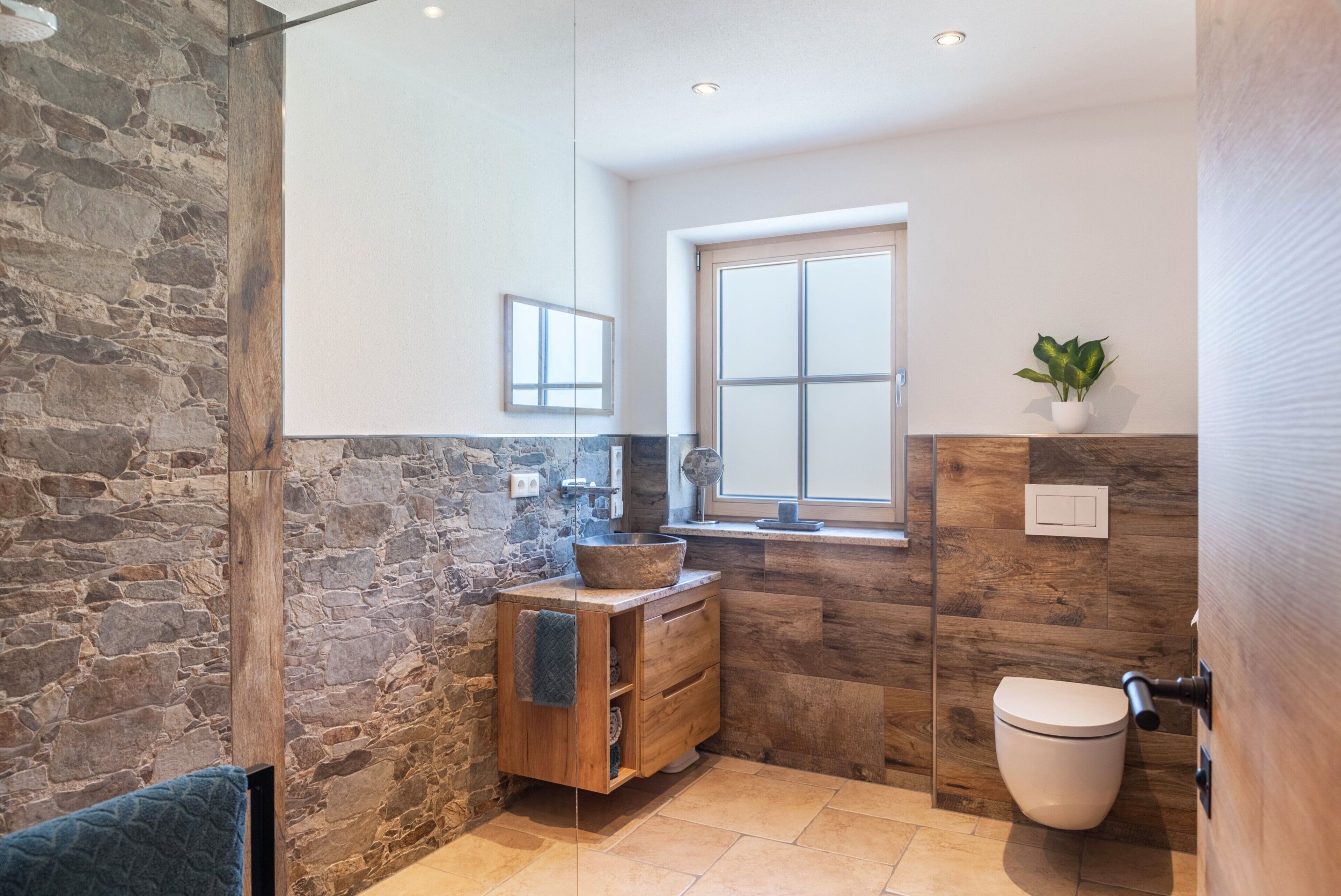 Dutxa, assecador de cabells i tovalloles 