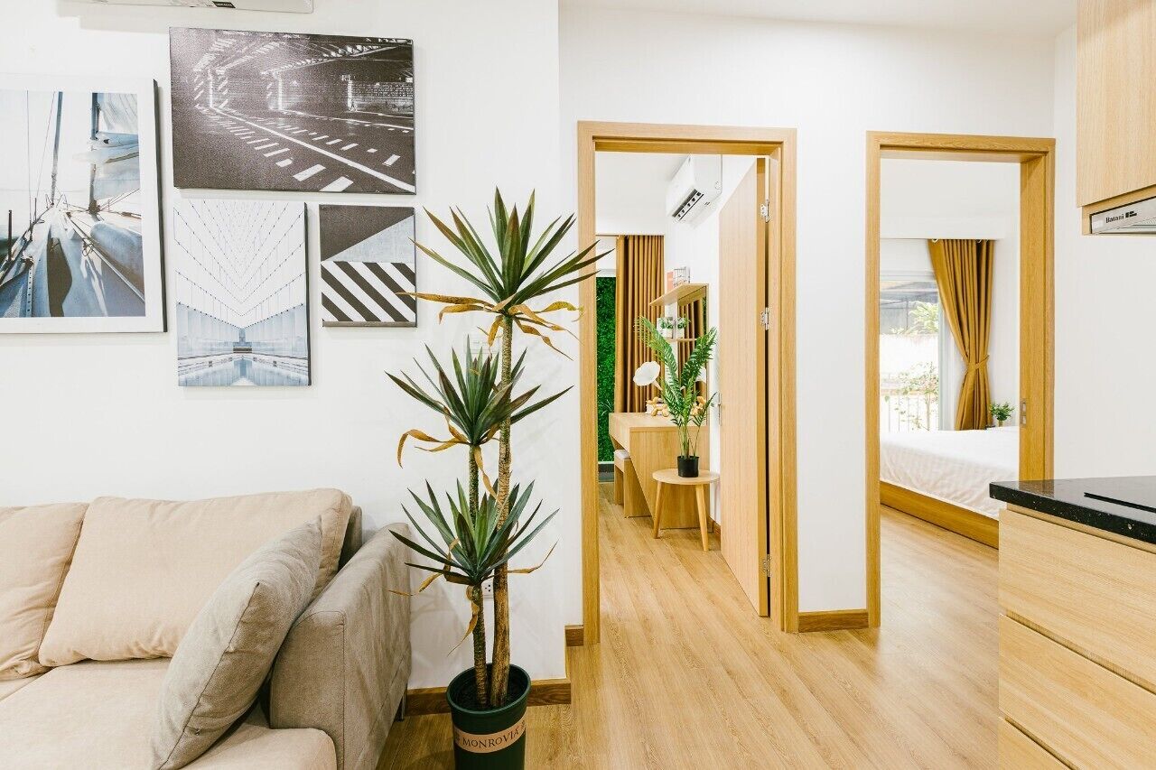 Apartamento família | Área de estar | TV, impressoras