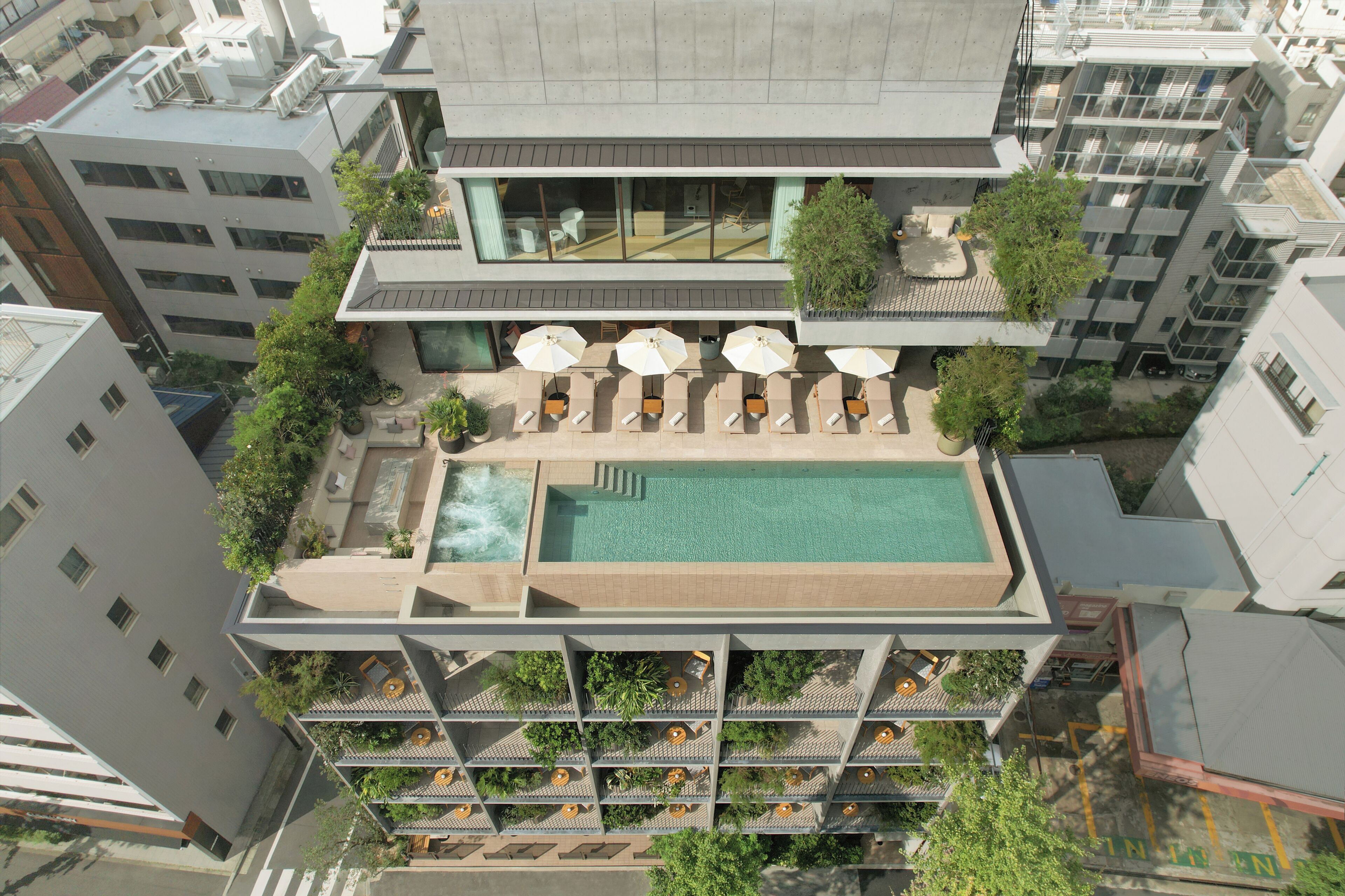 Outdoor pool, open 7:00 AM to 11:00 PM, pool umbrellas