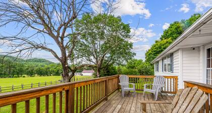 Inviting home with game room, firepit, full kitchen, central AC, & W/D
