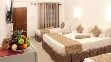 Premium bedding, pillow-top beds, minibar, in-room safe