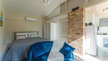 1 chambre, fer et planche Ă repasser, Wi-Fi gratuit, draps fournis