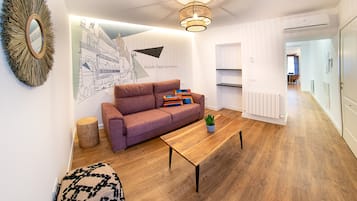 Familienapartment | Wohnbereich | Flachbildfernseher