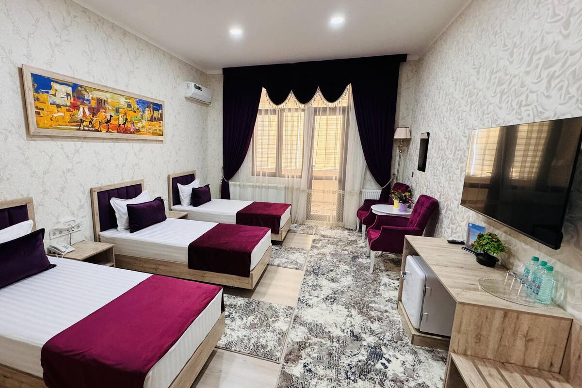Deluxe Triple Room | Hypo-allergenic bedding available, minibar, desk, laptop workspace