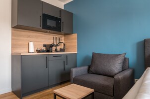 Appartamento Superior | Cucina privata | Macchina per tè/caffè, frigorifero, microonde, piano cottura