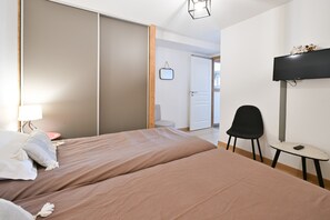 2 habitaciones, tabla de planchar con plancha y wifi gratis 