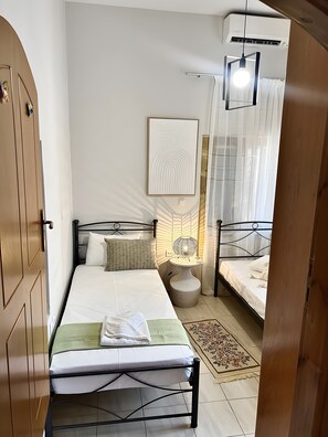 2 slaapkamers, een strijkplank/strijkijzer, gratis wifi, beddengoed