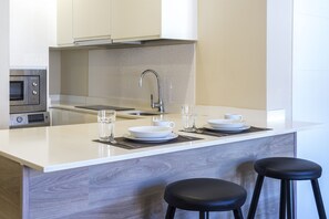 Fridge, microwave, dishwasher, coffee/tea maker