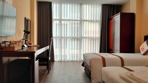 Minibar, desk, laptop workspace, blackout curtains