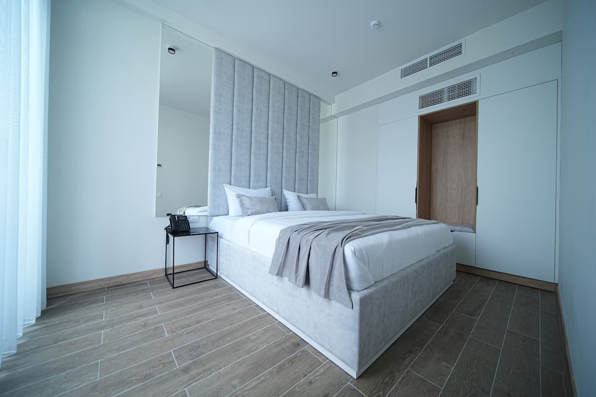 Suite ejecutiva, para no fumadores | Ropa de cama de alta calidad y caja de seguridad en la habitación