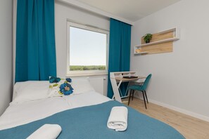 3 habitaciones, tabla de planchar con plancha, wifi y ropa de cama 