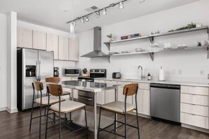 Apartment | Private kitchen - CozySuites at  Bottleworks District (Indianapolis)