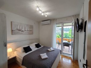 Apartment, 1 Queen-Bett und Schlafsofa | 2 Schlafzimmer, Bügeleisen/Bügelbrett, kostenloses WLAN, Bettwäsche