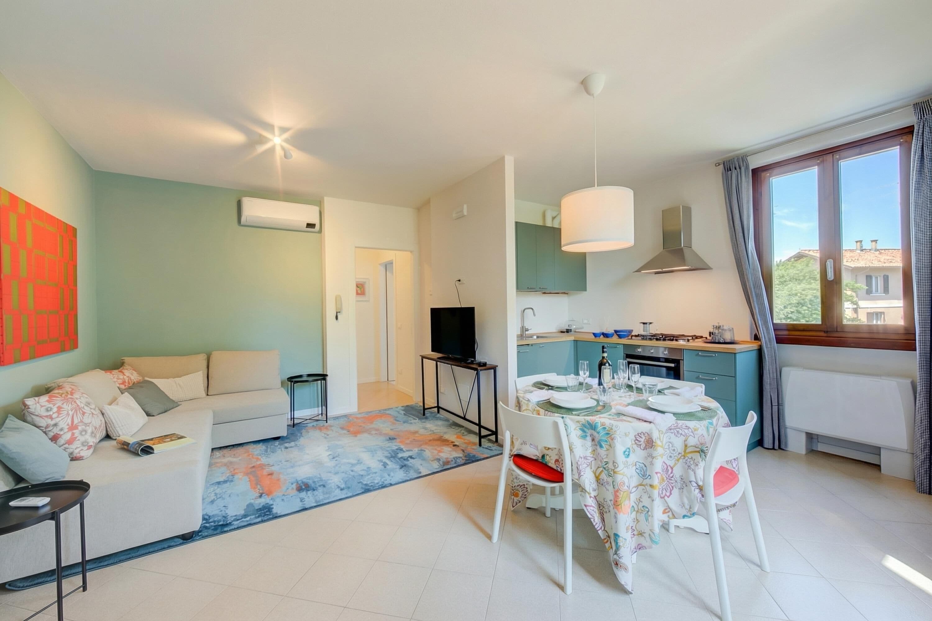 Family Apartment, Multiple Bedrooms (Casa Lia) | Living area | 21-inch Smart TV with cable channels