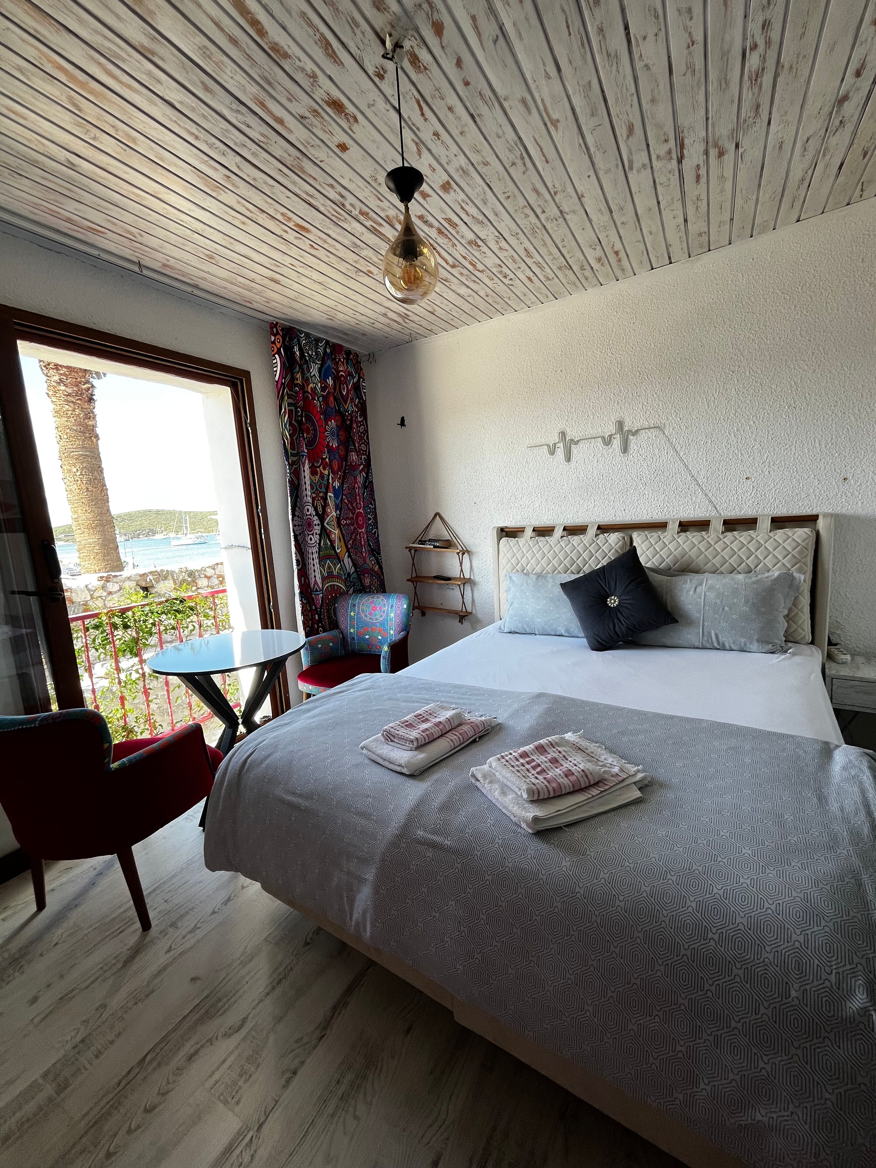 Chambre Panoramique, 1 grand lit, vue mer | Draps en coton égyptien, literie de qualité supérieure