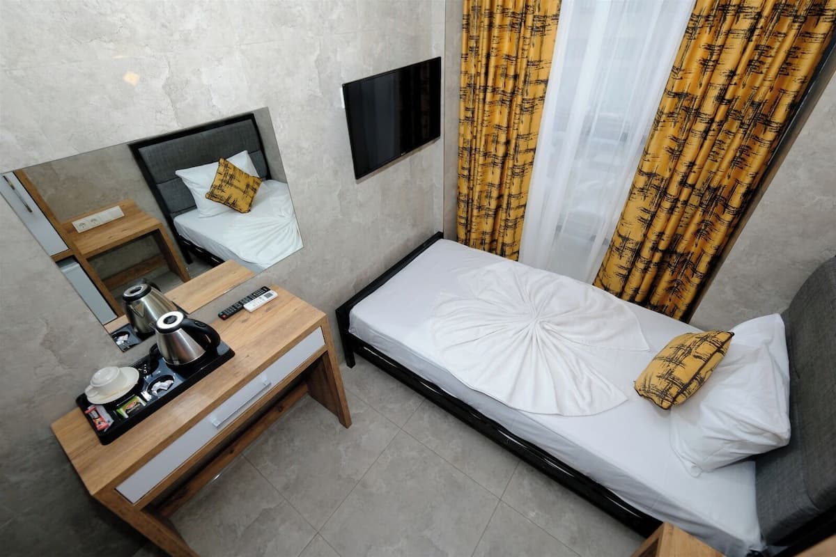 Chambre Simple | 1 chambre, minibar, coffres-forts dans les chambres, bureau