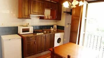 Apartemen Standar | Area keluarga | TV layar datar