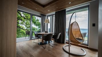 Exclusive Suite, 1 King Bed with Sofa bed, Slope side | Living area | LCD TV, heated floors