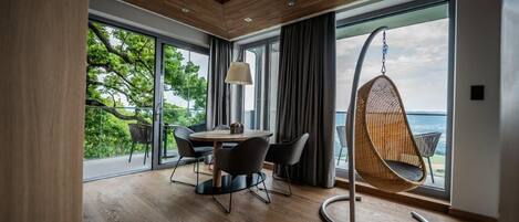 Exclusive Suite, 1 King Bed with Sofa bed, Slope side | Living area | LCD TV, heated floors