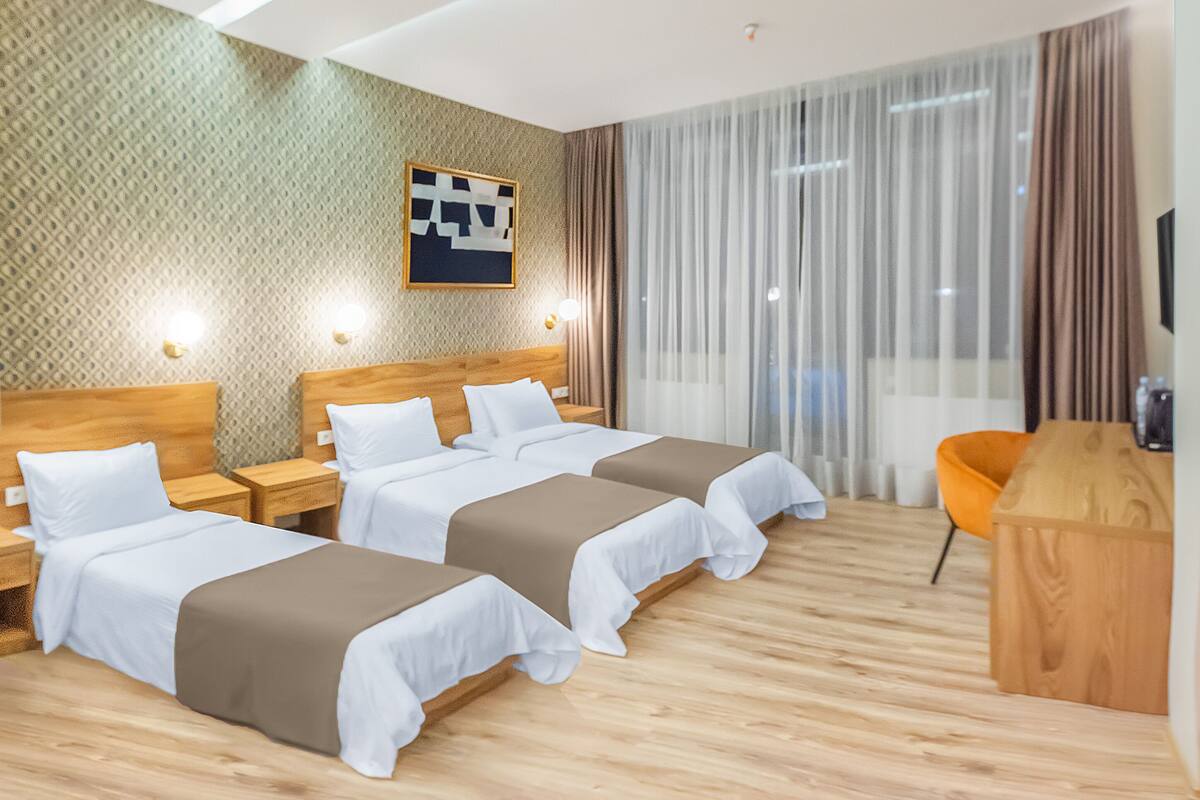 Deluxe-Dreibettzimmer
