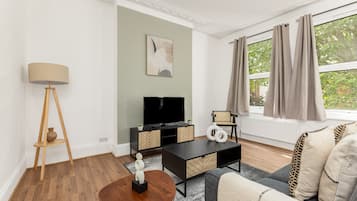 Apartment | Living area | 37-inch TV with cable channels, Netflix, streaming services