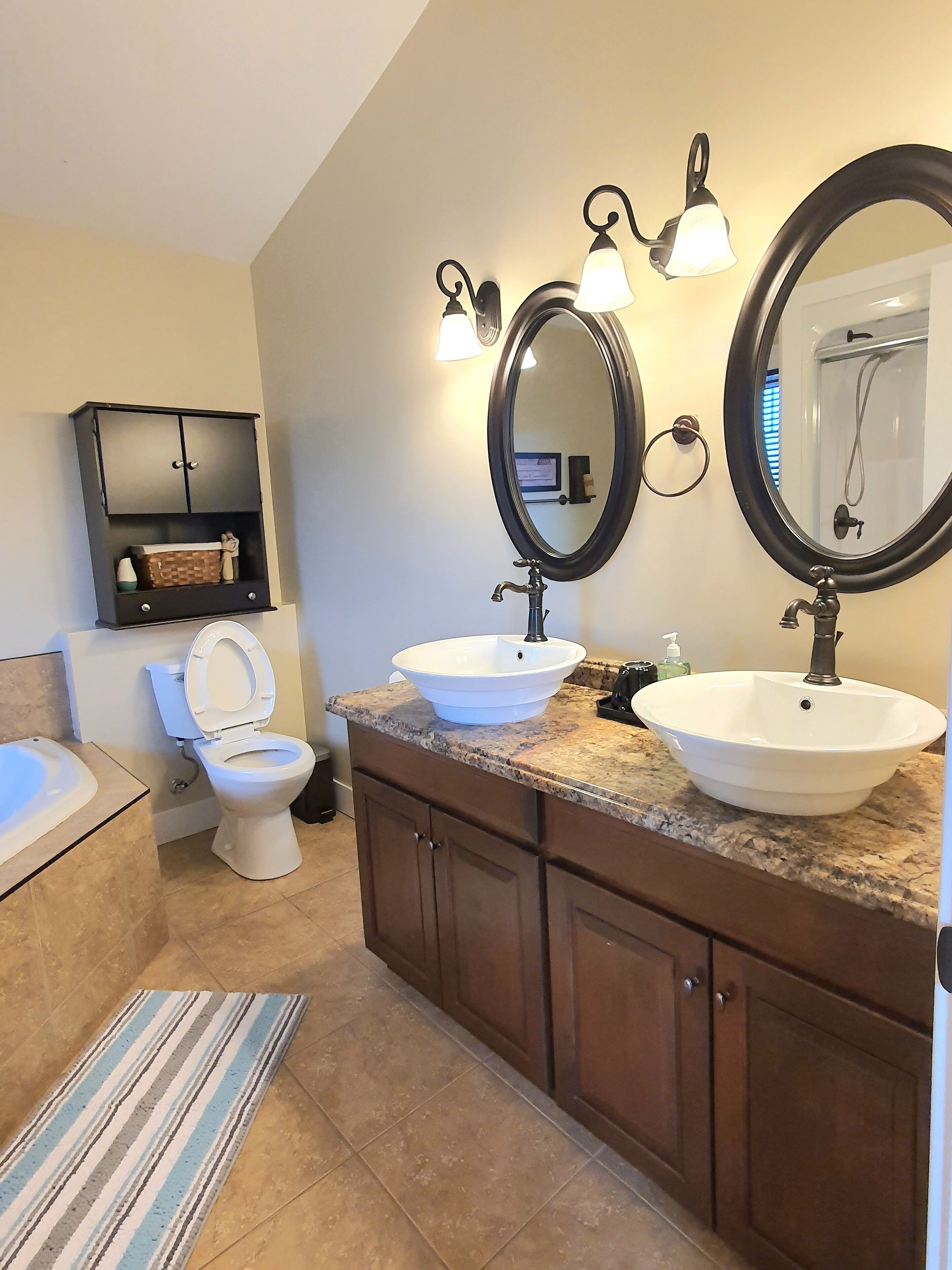Shower, jetted tub, hair dryer, bidet