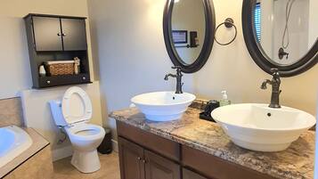 Shower, jetted tub, hair dryer, bidet
