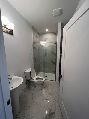 Shower, towels, soap, shampoo