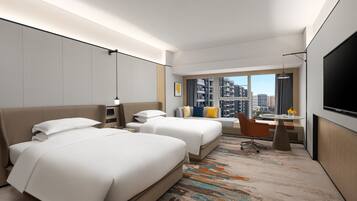 Down comforters, pillowtop beds, desk, blackout drapes