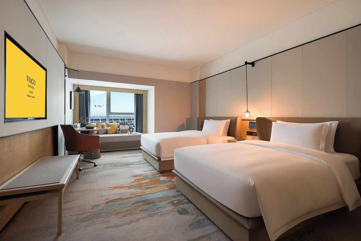 Down duvets, pillow-top beds, desk, blackout curtains