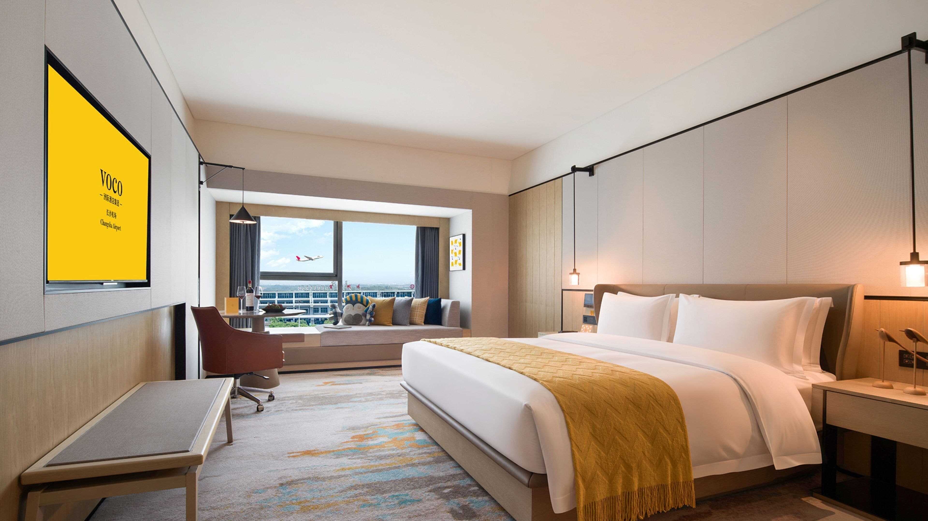 Down comforters, pillowtop beds, desk, blackout drapes