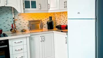 Panoramic Penthouse, 2 Bedrooms, Lake View | Private kitchen | Fridge, microwave, oven, stovetop