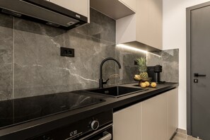 Ugn, spishäll, kaffe- och tebryggare och brödrost