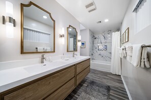 Bathtub, hair dryer, towels