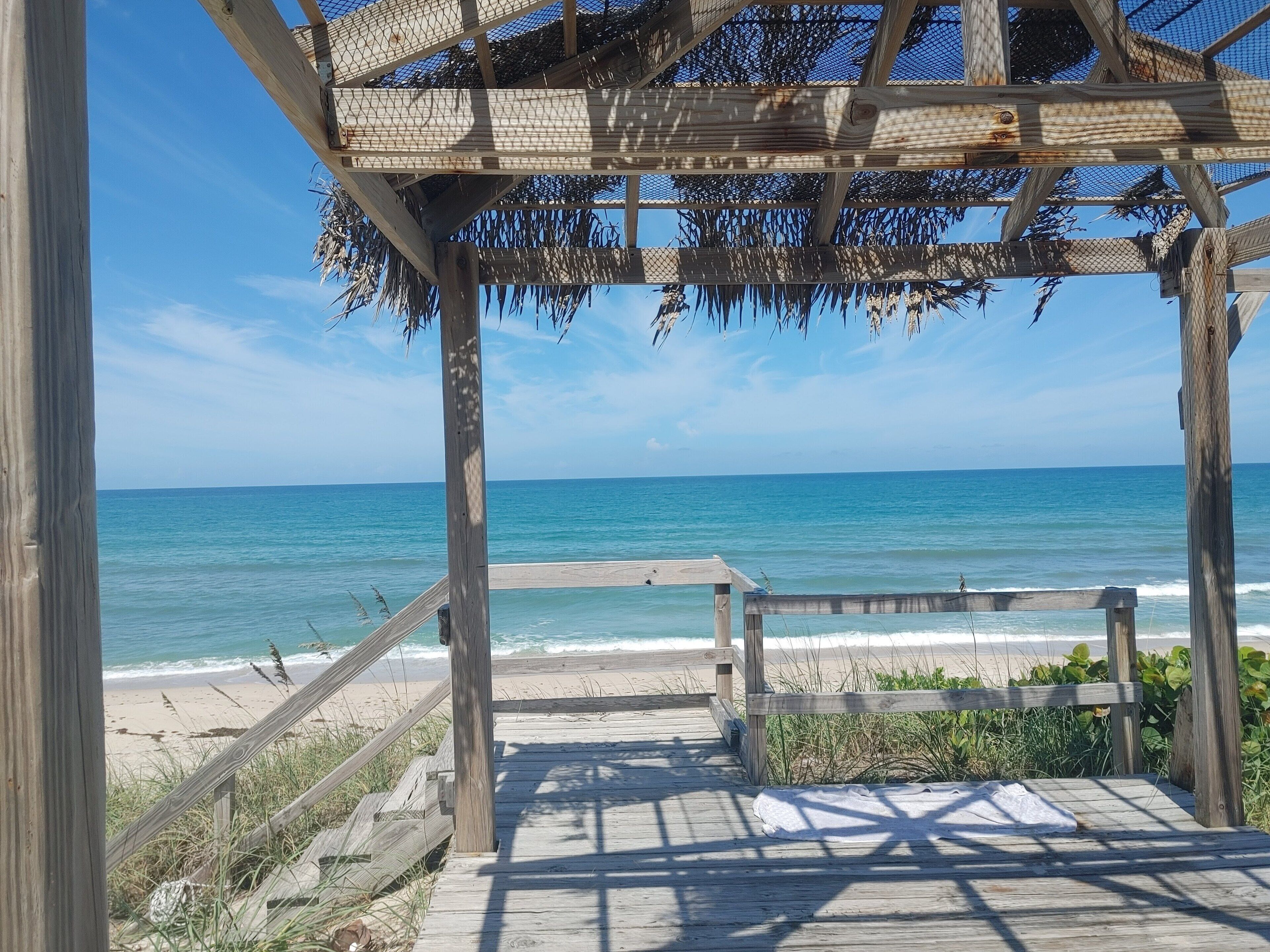 On the beach, sun loungers, beach towels