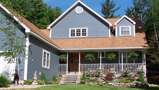 A two-story house with a front porch, stone steps, and a small garden. - Privacy yet close to downtown Saratoga (Greenfield Center)