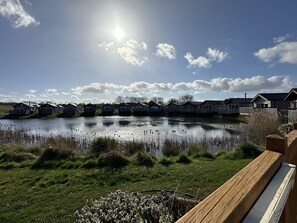 Property grounds - Stunning Coastal Lodge - Sleeping 4 in 2 Bedrooms - Pool and Beach Access Included. (Lakeside - The Meadows)