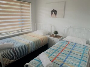 2 chambres, fer et planche Ă repasser, draps fournis