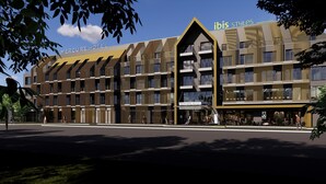 A modern hotel with a prominent entrance, multiple floors, and a sign for 'ibis styles'. - Mercure Sibiu Arsenal (Sibiu)