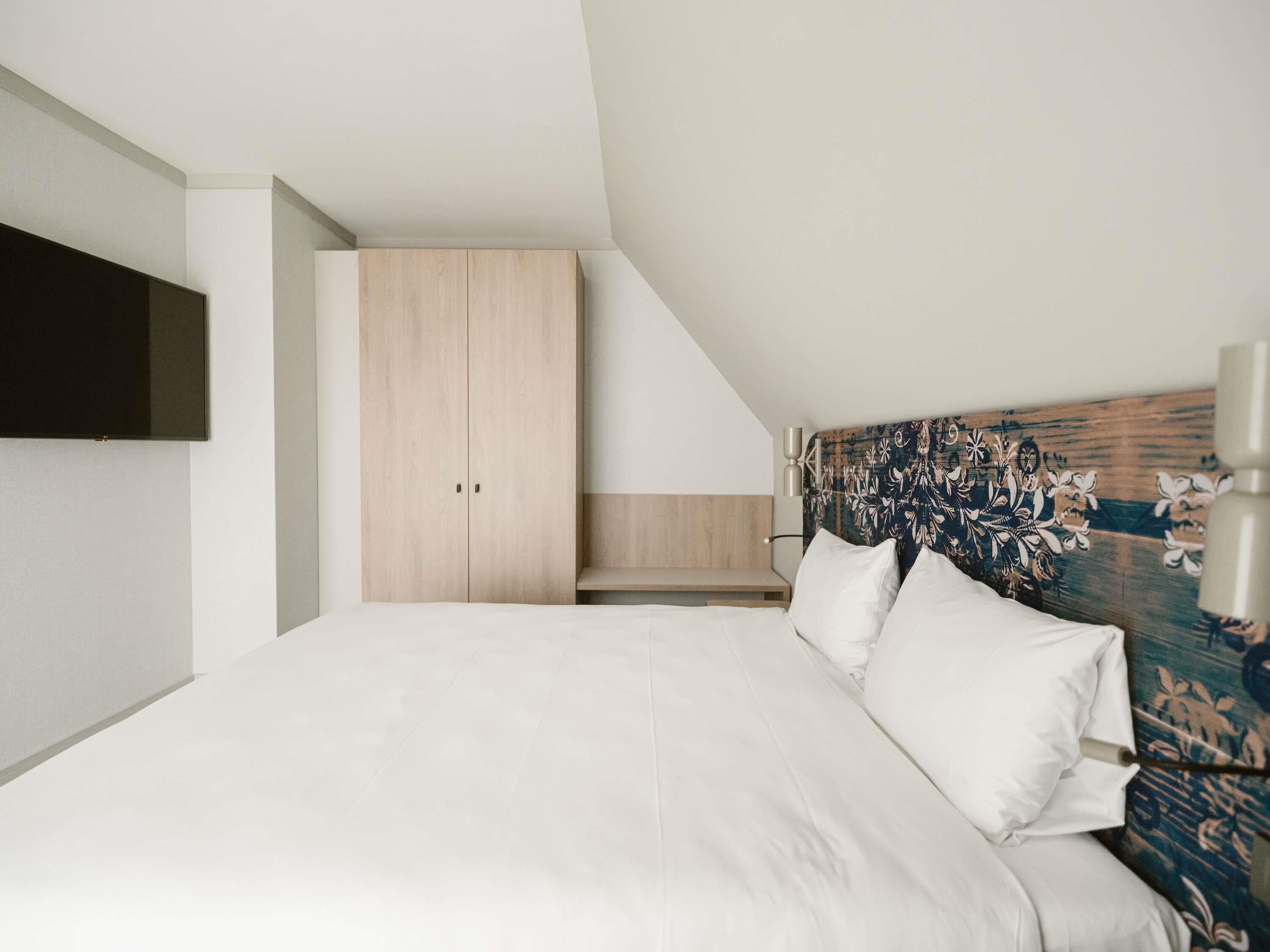 Rom – classic, 1 kingsize-seng | Sengetøy av topp kvalitet, minibar, safe på rommet og lydisolert