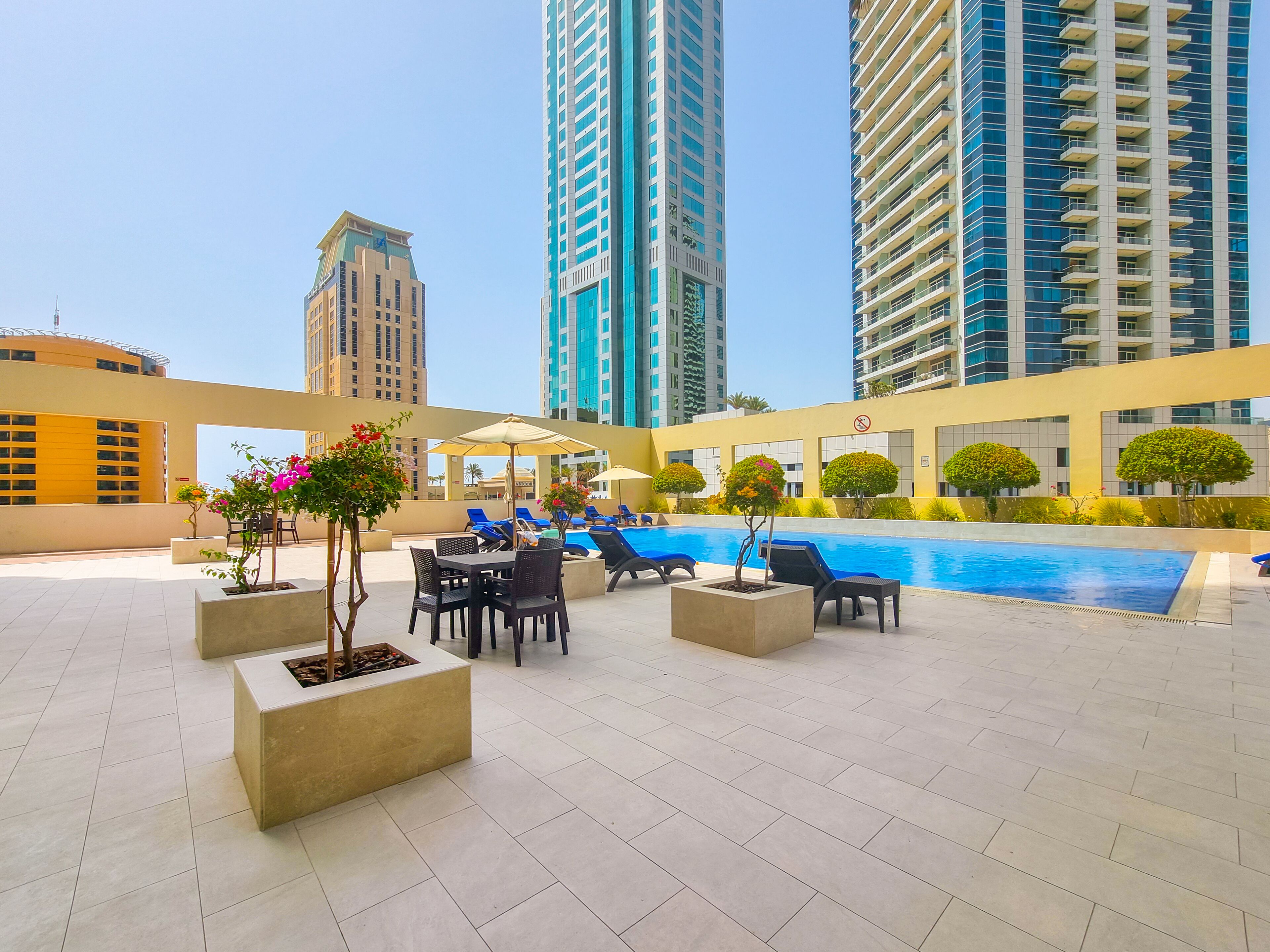 Outdoor pool, pool umbrellas, pool loungers