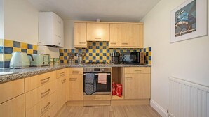 Apartamento, varias camas | Cocina privada