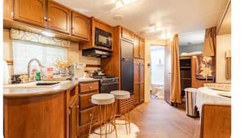 Fridge, stovetop, cookware/dishes/utensils, paper towels