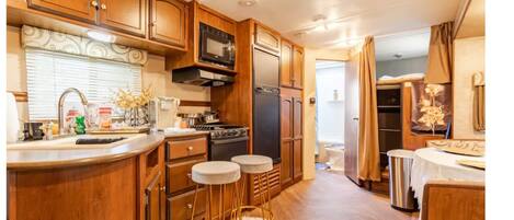 Fridge, stovetop, cookware/dishes/utensils, paper towels