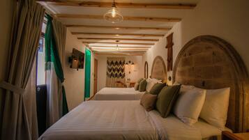 Premium bedding, in-room safe, individually decorated