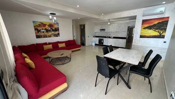 Apartamento | Área de estar | Smart TV