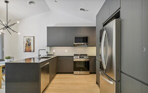 Fridge, microwave, oven, stovetop - Pickleball Dream - All New, Modern Condo in Sea Colony. 10mins walk to the beach (South Bethany)