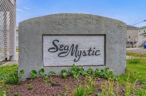 Welcome to Sea Mystic, a tranquil retreat nestled among residential buildings.