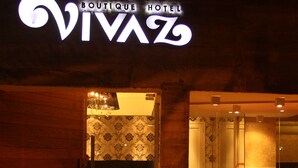 The entrance to Boutique Hotel VivaZ with a visible door and a small outdoor seating area. - Vivaz Boutique Hotel (Recife)