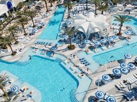 6 outdoor pools, cabanas (surcharge), pool umbrellas